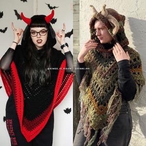 May include: A black crochet hooded poncho with bright red devil horns and a red border, alongside a multi-colored earth-toned crochet hooded poncho featuring two large, textured horns on the hood and a fringed hemline with a V-shaped design.