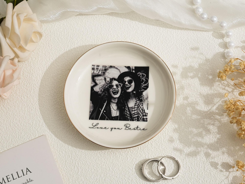 May include: A white ceramic mug with a black handle and the text "But First, Coffee" in a handwritten style. The mug is likely 11-15 ounces, perfect for a morning beverage.