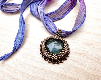 Labradorite bead embroidered pendant on purple silk ribbon