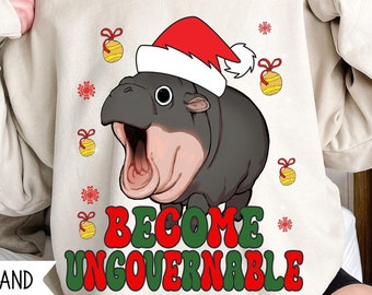 Sudadera navideña "Conviértete en un bebé hipopótamo ingobernable", meme rebelde