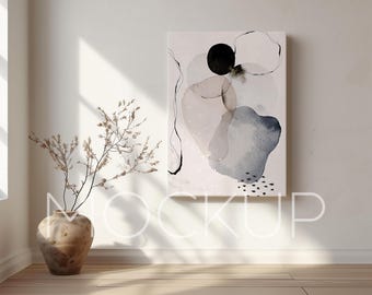 Könnte beinhalten: Abstrakter Kunstdruck mit weißem Hintergrund und schwarzen, grauen und blauen Aquarellformen. Der Druck ist gerahmt und hängt an einer weißen Wand.