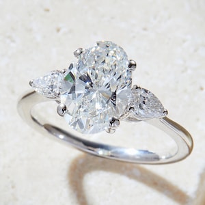 2.00 Carat Oval Shape Lab-Grown Diamond Engagement Ring with Side Pear Shape Stones in 14k Gold, F Color, VS1 Clarity, IGI Certified