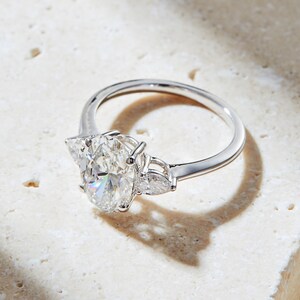 2.00 Carat Oval Shape Lab-Grown Diamond Engagement Ring with Side Pear Shape Stones in 14k Gold, F Color, VS1 Clarity, IGI Certified