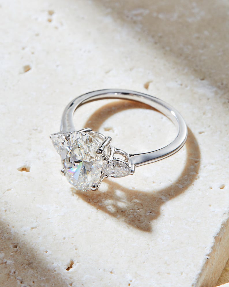2.00 Carat Oval Shape Lab-Grown Diamond Engagement Ring with Side Pear Shape Stones in 14k Gold, F Color, VS1 Clarity, IGI Certified
