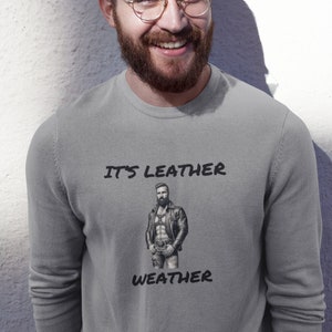 Cozy up in Style with our It&#39;s Leather Weather - Warm Unisex Heavy Blend™ Crewneck Sweatshirt