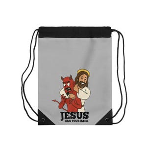 Bolsa com Cordão Jesus Solidário | Mochila Motivacional para Academia, Viagem e Escola | Presente Cristão Engraçado | Humor Diabólico Divertido | Acessórios para Uso Diário
