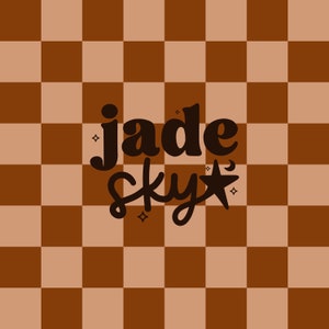 May include: A brown and tan checkered background with the text "jade sky" in black lettering. The text is stylized with a star and small sparkles.