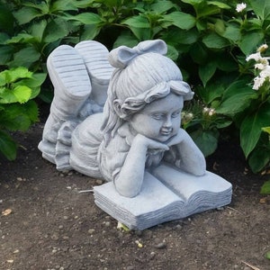 Cement laying girl with book sculpture, Stone massive child reading book statue, Concrete kid memorial figurine, Solid yard art figure, Gift