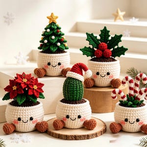 May include: Five crocheted potted plants with smiling faces, including a Christmas tree with a yellow star, a holly plant with red berries, a red poinsettia, a cactus wearing a Santa hat, and a plant with red and white striped candy canes.