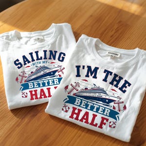 May include: Two white t-shirts with nautical-themed graphics. One shirt reads "Sailing with my Better Half" and the other says "I'm the Better Half." Each design features a cruise ship, anchors, and a banner.