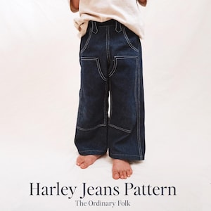 May include: Dark blue denim Harley Jeans Pattern with white stitching. The jeans have a wide leg design and are shown on a child. The text "Harley Jeans Pattern" and "The Ordinary Folk" are at the bottom.
