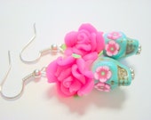 Sugar Skull Earrings Turquoise and Bright Pink Flower Eyes Day of the Dead Roses and Skulls