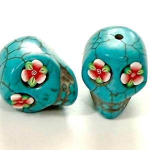 Turquoise Howlite 18 mm Sugar Skull Beads with Red Flower Eyes