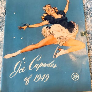 May include: Vintage Ice Capades of 1949 program cover. The cover features a glamorous illustration of a woman ice skating in a black and white outfit against a blue background. The text "Ice Capades of 1949" is written in cursive.