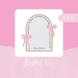 May include: A digital file design with a light pink background. The design features a light beige arch with the words "I am strong, I am brave, I am smart, I am enough, I am important". Two pink bows and the text "I am Claire" are also included.