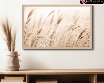 May include: A framed photograph of tall, feathery grasses blowing in the wind. The grasses are a light brown color and the background is a soft, blurred white.