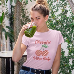 Cherry &quot;Cherrific Vibes Only&quot; t-shirt with a cute red gingham cherry design—fun, fresh, and perfect for sweet summer trendy vibes!