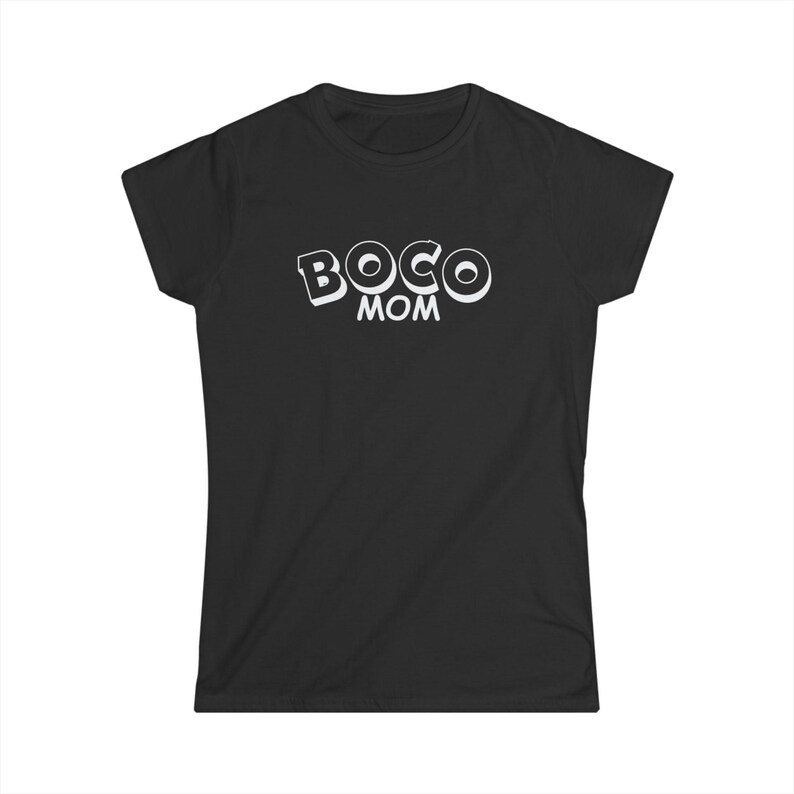 May include: Black t-shirt with the white text "BOCO MOM" in a playful, bubble-style font. The shirt has short sleeves and a crew neck. The text is centered on the front of the shirt.