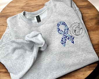 Colon Cancer Embroidered Crewneck, Cancer Gifts, Colon Cancer Awareness T Shirt, Colon Cancer Blue Crewneck Heart Ribbon (Original Creator)