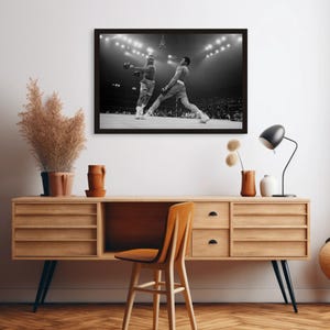 Puede incluir: Fotograf&iacute;a en blanco y negro de dos boxeadores en un ring de boxeo. El boxeador de la izquierda est&aacute; lanzando un pu&ntilde;etazo, mientras que el boxeador de la derecha est&aacute; bloqueando el pu&ntilde;etazo.