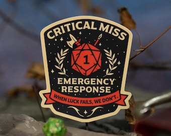 May include: A black and gold patch with the words "CRITICAL MISS EMERGENCY RESPONSE" and the text "WHEN LUCK FAILS, WE DON'T." A red die with the number 1 is in the center. Other dice and a sword are in the background.
