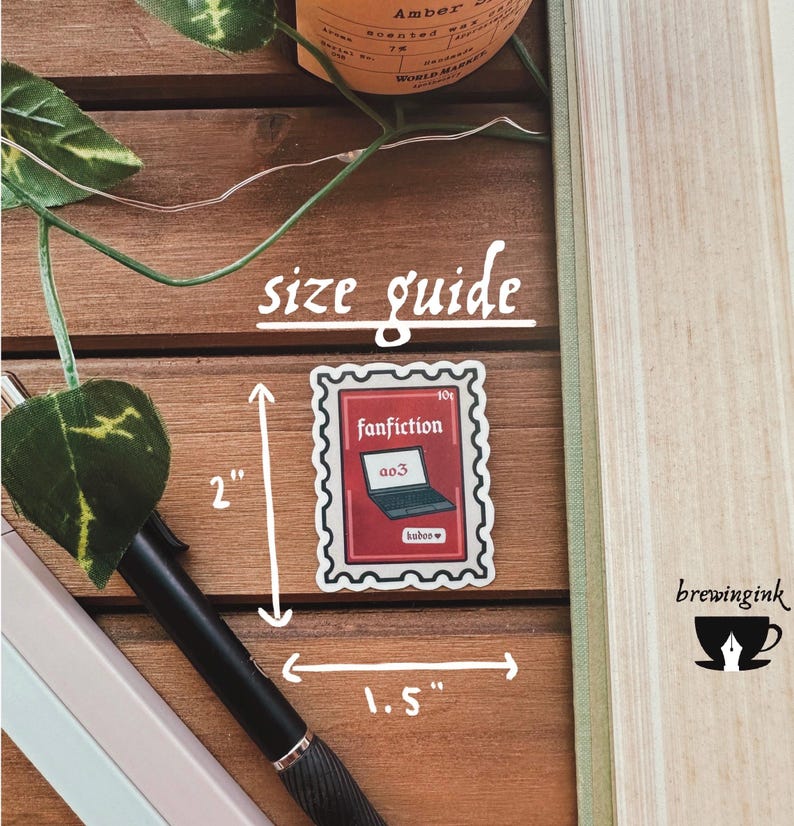 May include: Size guide for a 2 inch by 1.5 inch sticker featuring a red and white stamp with the text "fanfiction ao3" and a laptop computer graphic. The sticker is surrounded by a white border.