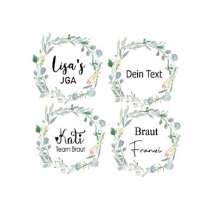 Op de afbeelding: Vier aquarelkransen met groene bladeren en bloemen. De kransen hebben tekst erin, waaronder "Lisa's JGA", "Dein Text", "Kati Team Braut" en "Braut Franzi".