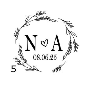 May include: A black and white graphic design featuring the letters N and A separated by a small heart, with the date 08.06.25 below. The text is enclosed in a circular wreath of thin, stylized leaves and branches, with the number 5 in the corner.