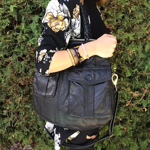 Multi purpose reclaimed leather handbag
