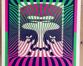 Obra original de Shepard Fairey (OBEY), icono del Op Art, firmada y numerada a mano por el artista. Edición limitada 113/250.
