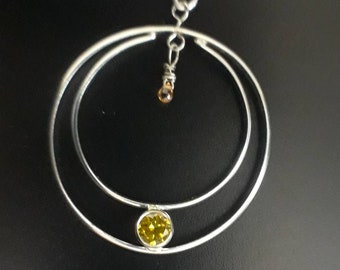 Argentium silver pendant set with 5mm sparkly yellow CZ and a small natural sapphire briolette