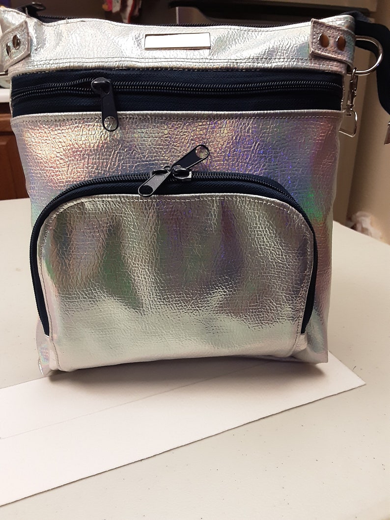 Kaylee crossbody bag in holographic vegan leather. Cotton lining with multiple pockets. image 1