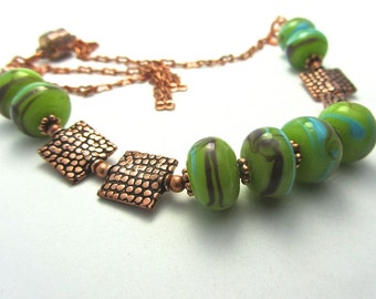 Lime green lamp work beaded NECKLACE with square copper snakeskin pattern beads with magnetic clasp. Whole  OOAK set is available