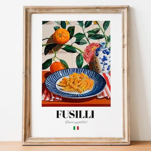 May include: A framed illustration of a plate of fusilli pasta with a blue and white design. The plate is on a red and white checkered tablecloth. There are oranges and a blue and white vase with flowers in the background. The text "FUSILLI" and "Buon appetito!" is printed below the image.