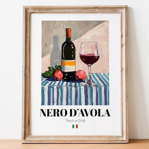 May include: A painting of a bottle of red wine, a glass of red wine, and two red apples on a blue and white striped tablecloth. The bottle is labeled "NERO D'AVOLA Made in Italy".