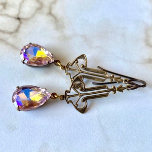 Filigree dangle earrings with iridescent champagne pink pear shaped drops