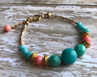 Aqua and coral pink bracelet eith gold accents