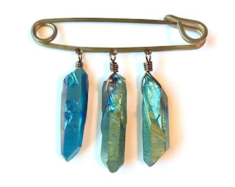 Rock Crystal kilt pin brooch, iridescent blue and green