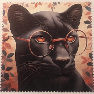 May include: A black panther with orange eyes wearing round, red-rimmed glasses. The panther is looking directly at the viewer with a serious expression. The background is a floral pattern in shades of brown, orange, and pink.