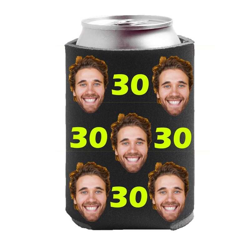 May include: Black neoprene can cooler with a repeated pattern of a man's face and the number 30 in bright yellow.