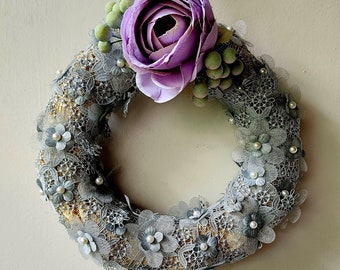 Wreath with artificial flowers