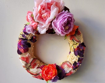 Wreath with artificial flowers