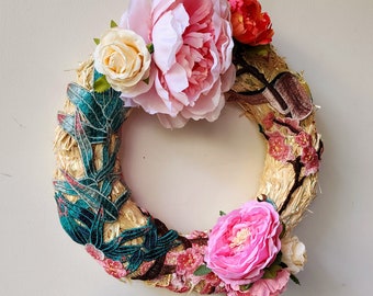 Wreath with artificial flowers