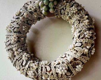 Wreath with artificial flowers