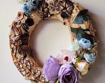 Wreath with artificial flowers