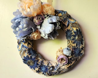 Wreath with artificial flowers