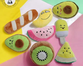 May include: A set of nine plush dog toys shaped like various fruits, including a banana, avocado, watermelon, kiwi, and a popsicle. The toys are all brightly colored and have cute faces.