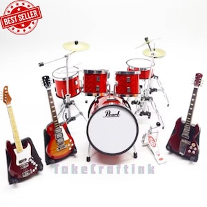 May include: A miniature red drum kit with cymbals and a bass drum with the word "Pearl" on it. Includes three guitars in red and brown. The text "TakeCraftink" is at the bottom of the image. A "Best Seller" sticker is in the top left corner.