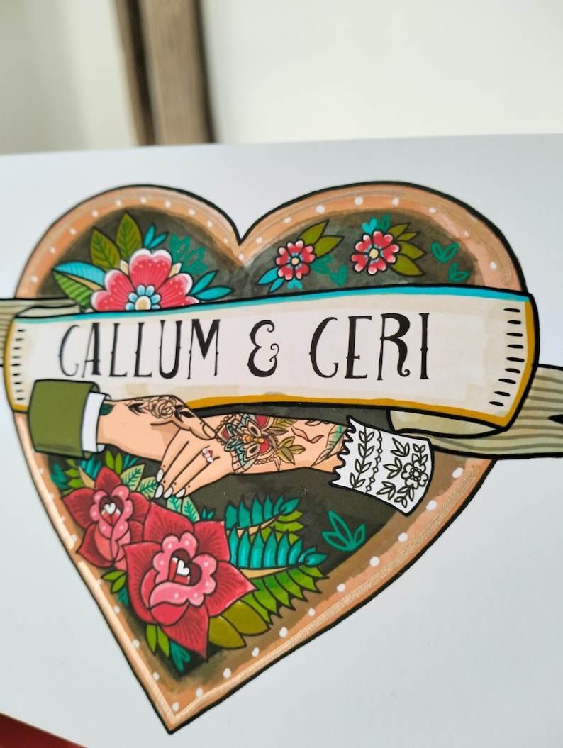 May include: A heart-shaped illustration featuring a banner with the text CALLUM & CERI. Inside the heart, two hands are joined, one wearing a green sleeve and the other a white lace cuff. The design is decorated with red and pink flowers.