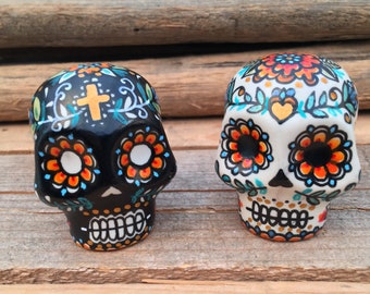 Sugar Skull Salt and Pepper Shakers, Ceramic | Hand Painted with decorative flowers | Traditional folk calavera design.